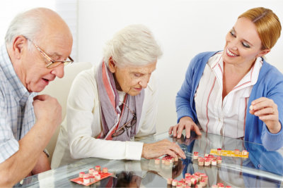 The woman is playing with the elders